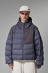 Navy blue women’s puffer jacket front close view, street fit