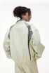 Light gray tracksuit side view, raglan racing lines and wide leg pants