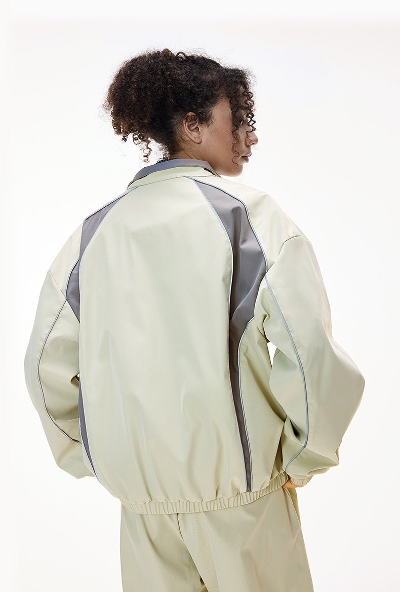 Light gray tracksuit side view, raglan racing lines and wide leg pants