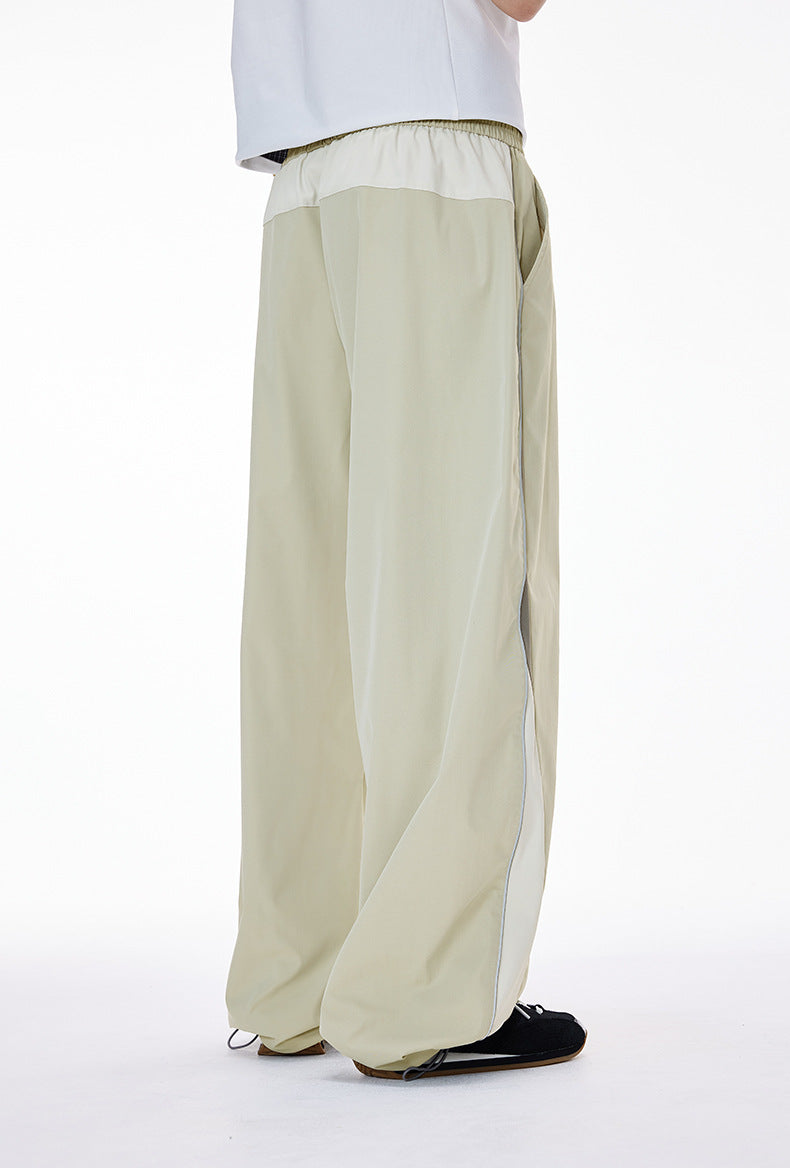 Light gray women’s wide leg pants back-side angle, straight cuff