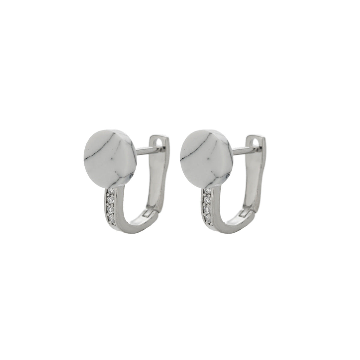 Front view of white marble-effect stud earrings with silver frame.