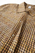 Yellow plaid shirt collar and top button detail, seersucker checks