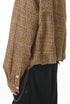 Yellow plaid shirt side view, sleeve drape and drop shoulder