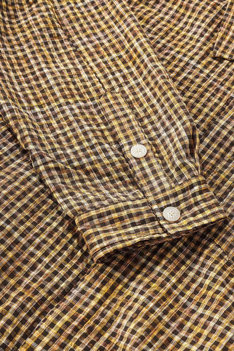 Yellow plaid shirt sleeve and cuff placket detail, micro checks