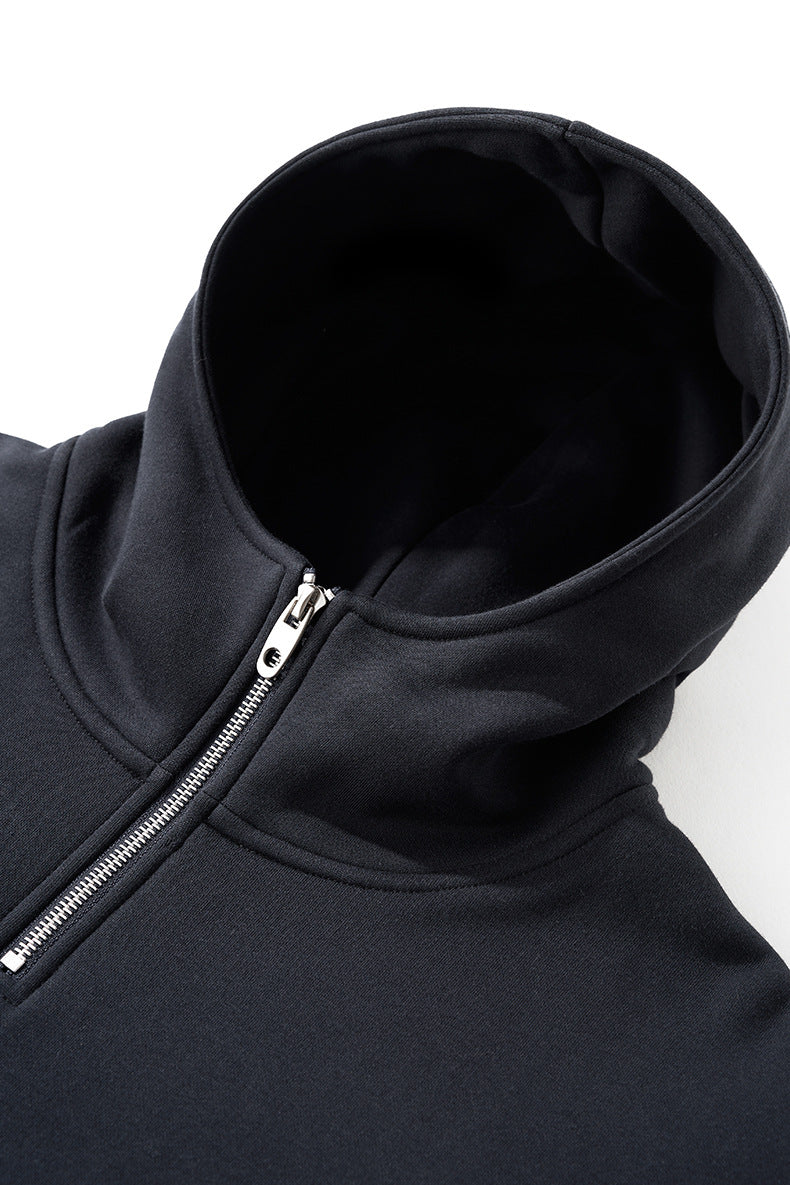 Navy hoodie close-up of funnel hood opening and neckline