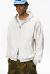 Quill gray zip hoodie on male model, hands in pockets