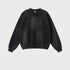 Black oversized sweatshirt with ribbed trim detail, showcasing soft brushed cotton texture