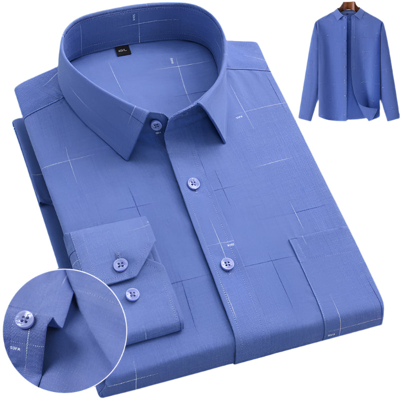 Medium blue dress shirt with subtle windowpane pattern. Detailed circular inset shows button and fabric texture with full shirt displayed on wooden hanger