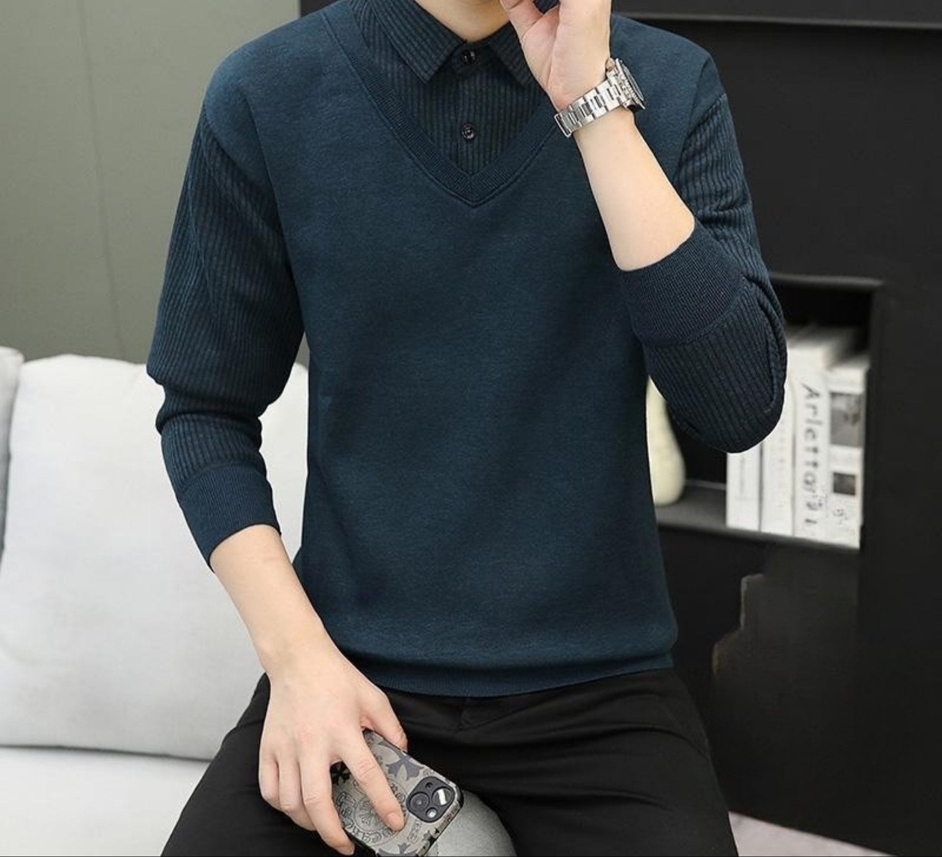 Dark green V-neck sweater with ribbed sleeves