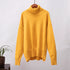 Mustard yellow turtleneck hanging, soft knit, relaxed fit, minimal background