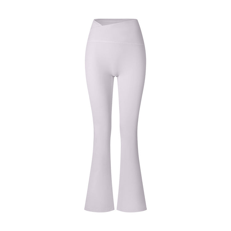 White high-waisted flared yoga pants photographed flat against white background, showing full-length silhouette and wide waistband