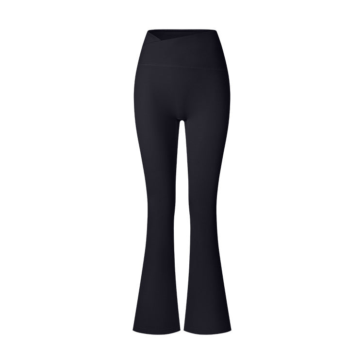 Black high-waisted flared yoga pants photographed flat against white background, showcasing bootcut design and stretch fabric