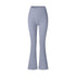Powder blue high-waisted flared yoga pants photographed flat against white background, featuring seamless construction