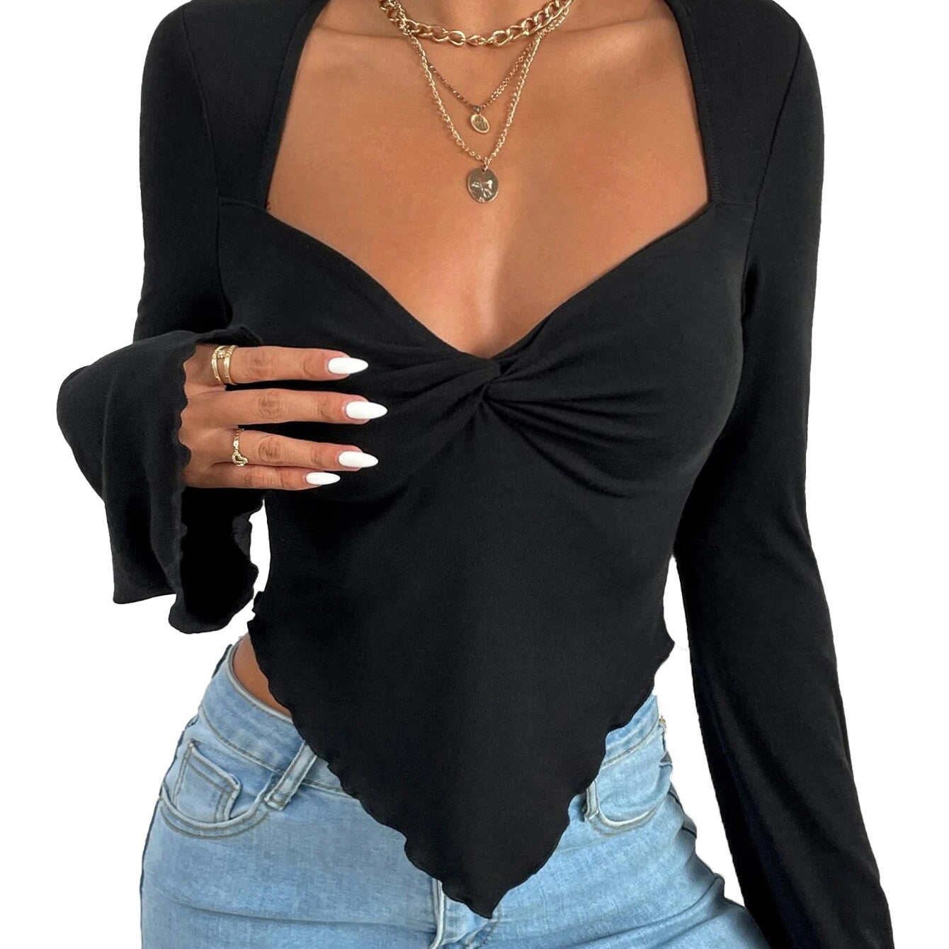 Detailed view of black sweetheart top with gathered front, white nails, and gold chain necklaces