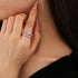 Close-up of intricate snake-inspired diamond ring on elegant hand