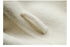 Macro texture shot of cream wool coating fabric showing fiber detail