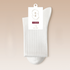 Pure white cotton sock with minimal product packaging and Chinese characters