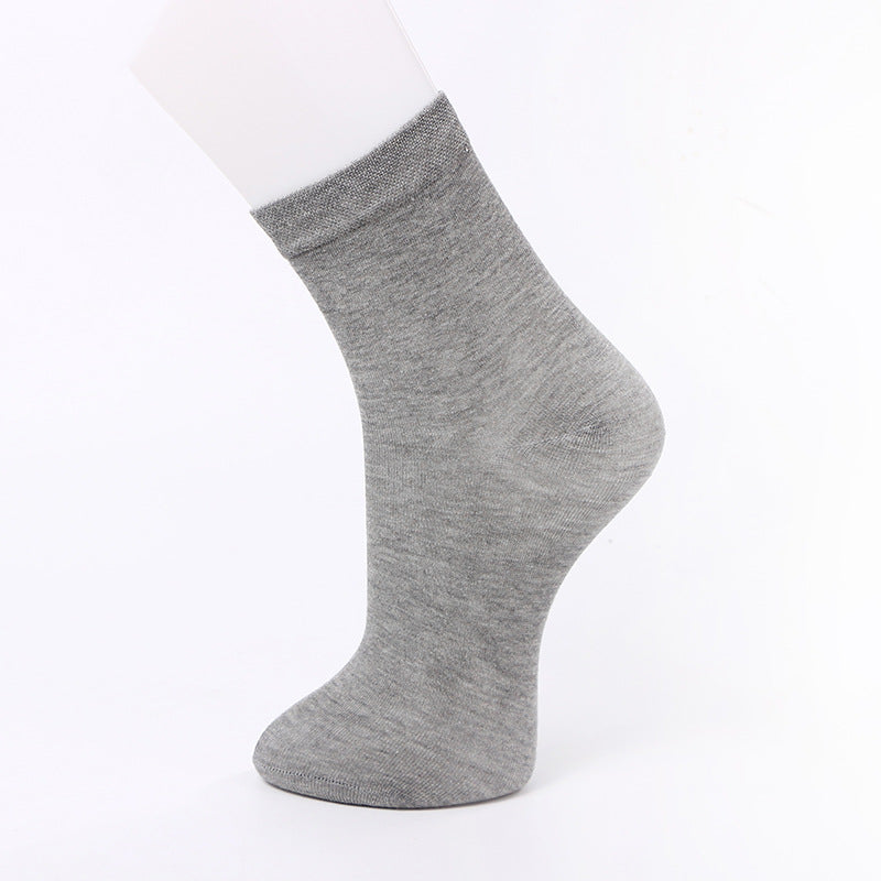 Light gray ankle sock displayed on a mannequin foot