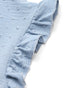 Close-up of ruffle sleeve detail on a baby blue babydoll dress.