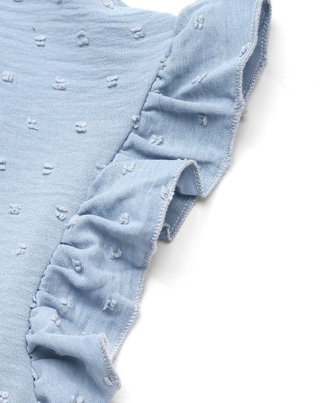 Close-up of ruffle sleeve detail on a baby blue babydoll dress.