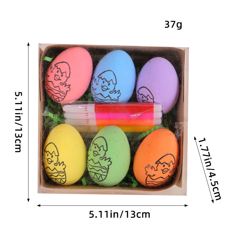 Easter egg painting kit with six pastel-colored eggs featuring a chick design, along with six markers, displayed with measurements.