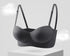 Black strapless bra with molded cups and a bow detail on the band.