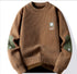 Brown ribbed sweater with olive elbow patches and U logo patch