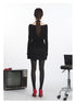 Black off-shoulder knit sweater with folded neckline and fitted silhouette. Back view revealing full length of the garment.
