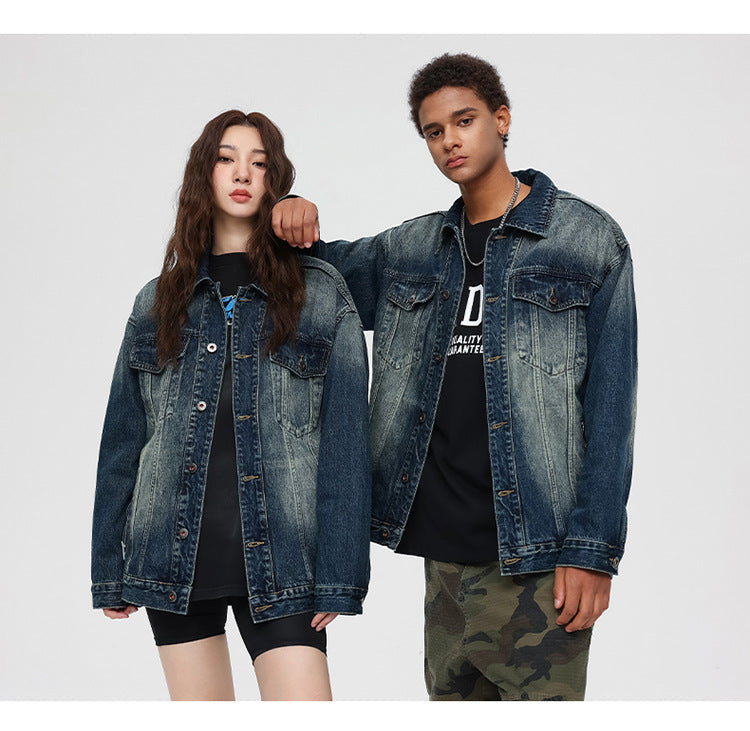 Distressed denim jacket product photo with two models wearing matching oversized jackets against white background