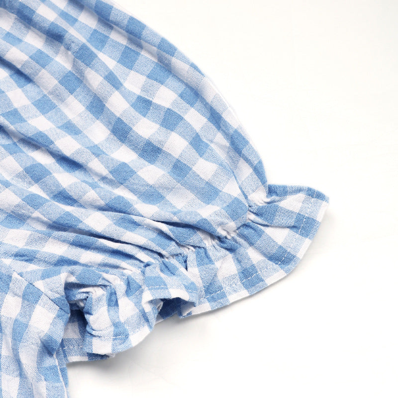 Close-up of the puff sleeve with a ruched elastic cuff, highlighting the feminine and stylish design.
