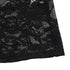A close-up of the intricate black lace fabric at the dress's hem, showing the delicate floral pattern.