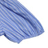 A close-up of the puff sleeve with elasticized cuffs on the blue striped dress.