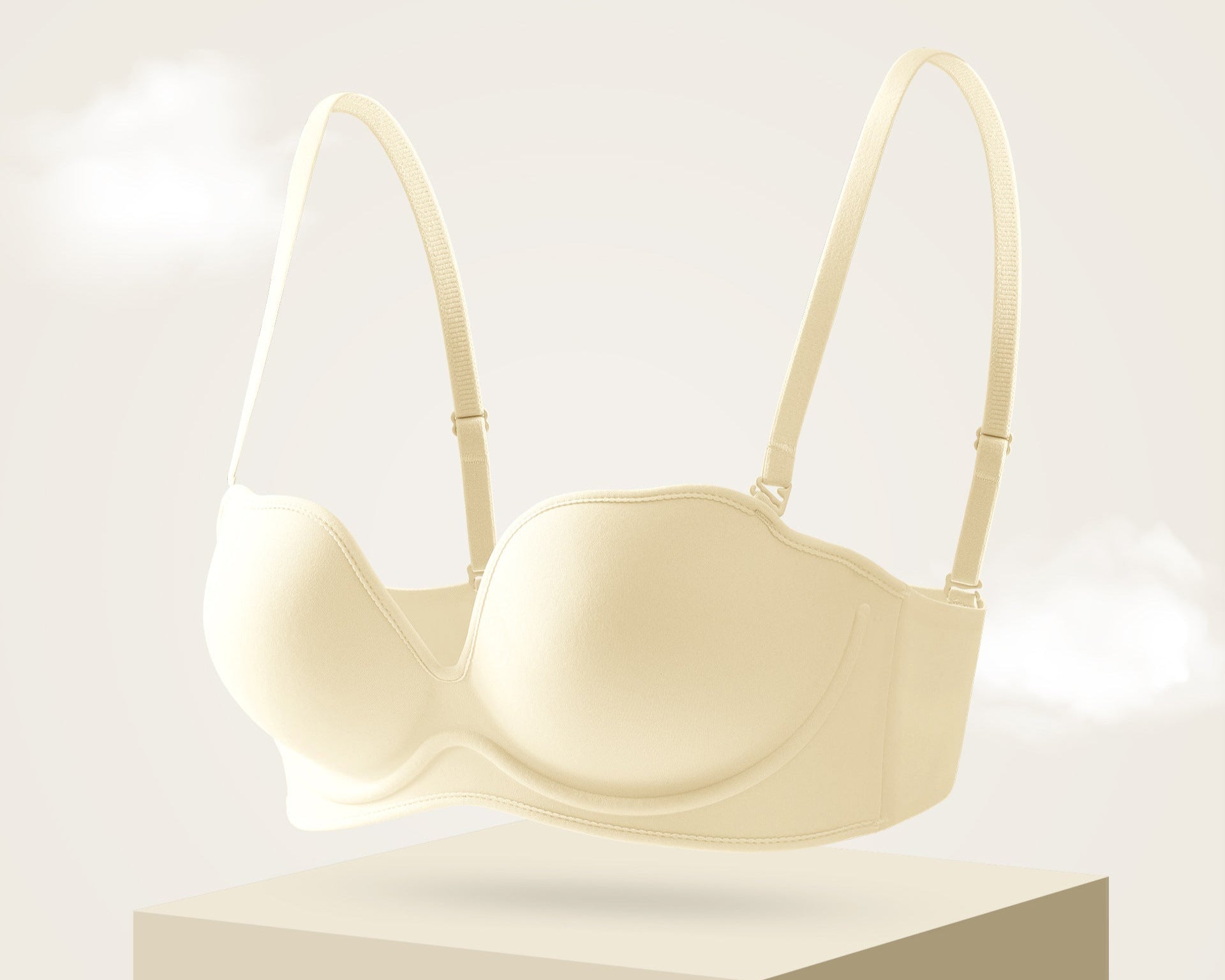 Beige seamless strapless push-up bra designed for lift and support with a smooth, breathable fabric.