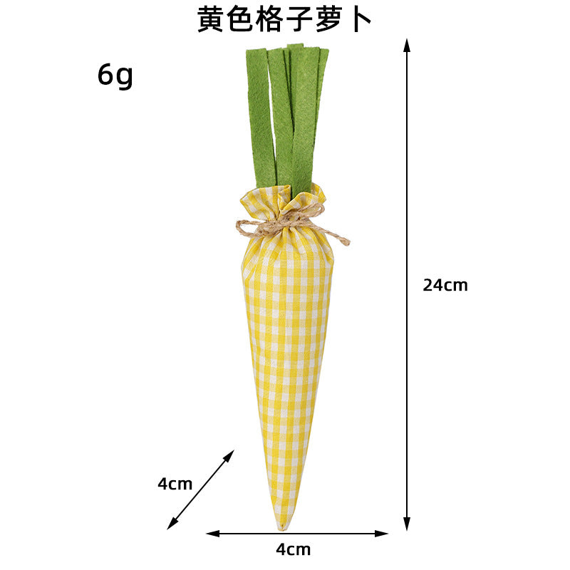 A yellow gingham fabric carrot with green felt leaves, measuring 24cm in length and 4cm in width, weighing 6g.