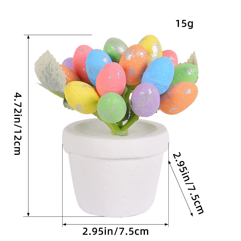 A close-up of a white ceramic pot filled with multicolored artificial eggs, with measurement annotations showing the height and width of the decorative item.
