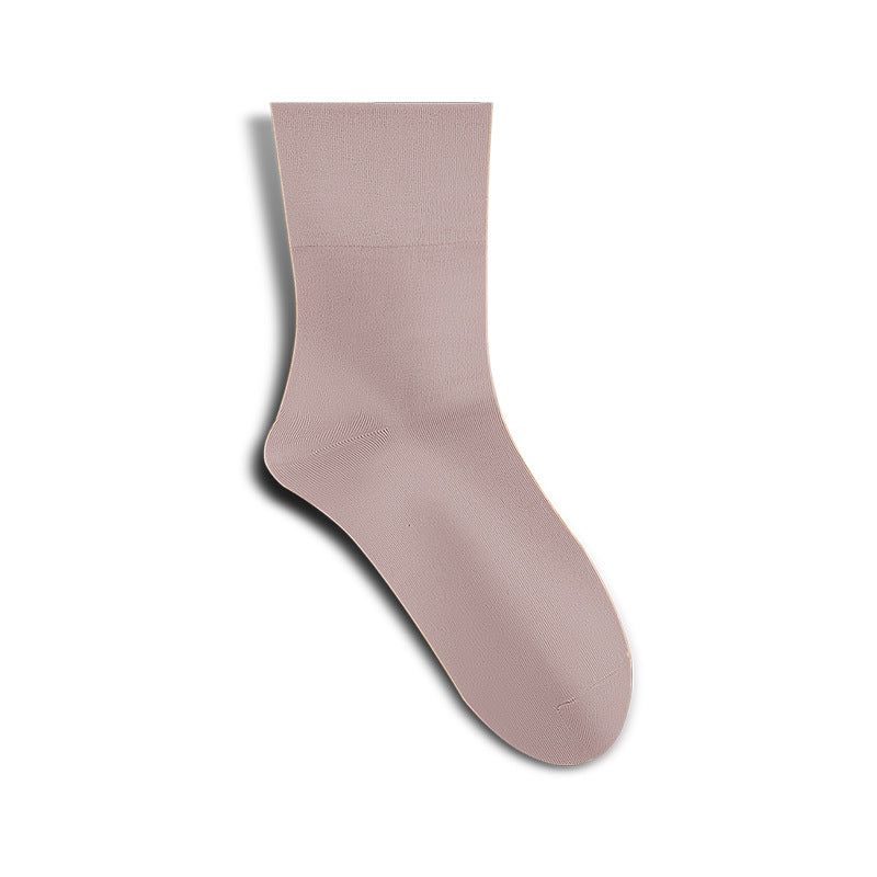 A single lilac colored crew sock displayed against white background, showing smooth seamless construction and mid-calf length