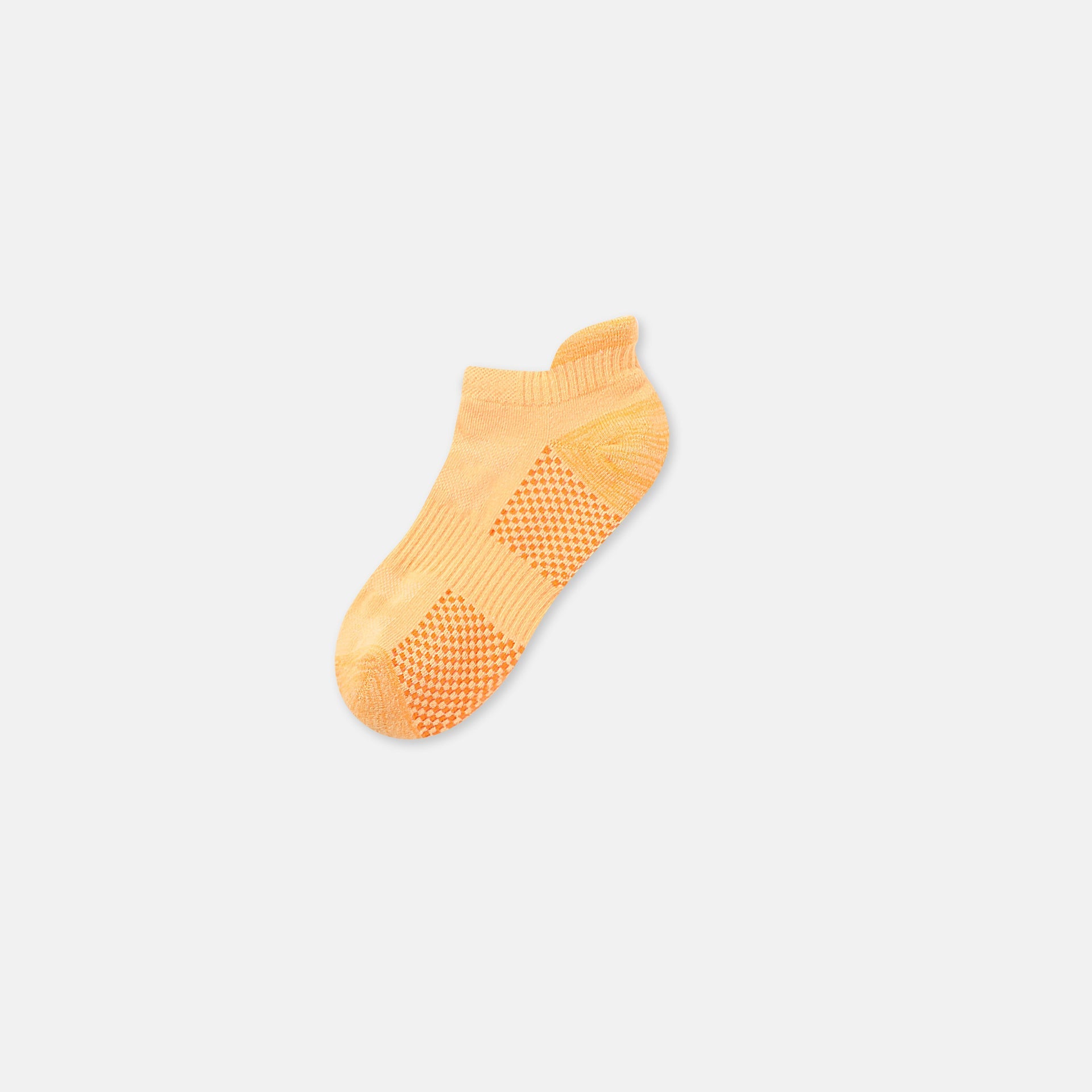 Yellow athletic ankle sock with checkered cushion pattern and ribbed arch support, displayed flat against white background