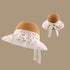 A khaki woven sun hat with a lace-trimmed brim and a ribbon bow at the back, highlighting its texture and intricate lace details.