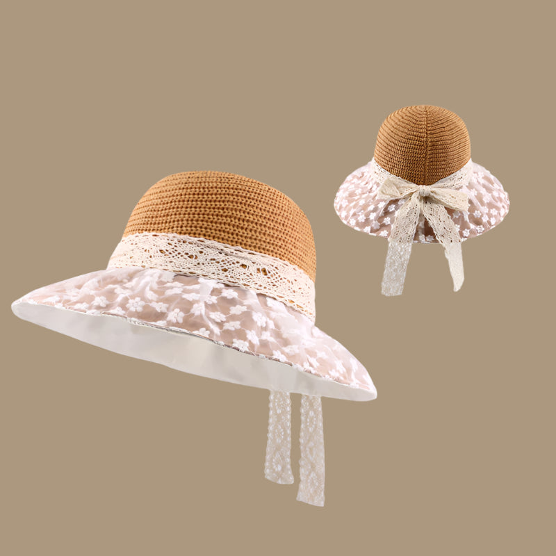 A khaki woven sun hat with a lace-trimmed brim and a ribbon bow at the back, highlighting its texture and intricate lace details.