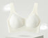 White seamless bra with cooling fabric displayed on a pedestal.