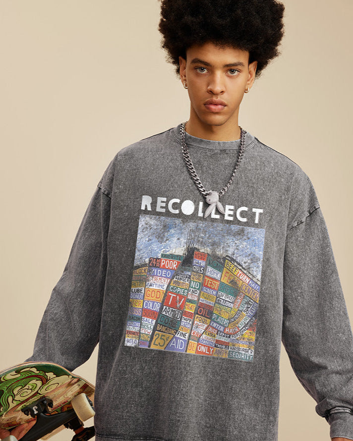 A male model wears a gray "RECOLLECT" sweatshirt with a bold graphic, holding a skateboard, posing casually