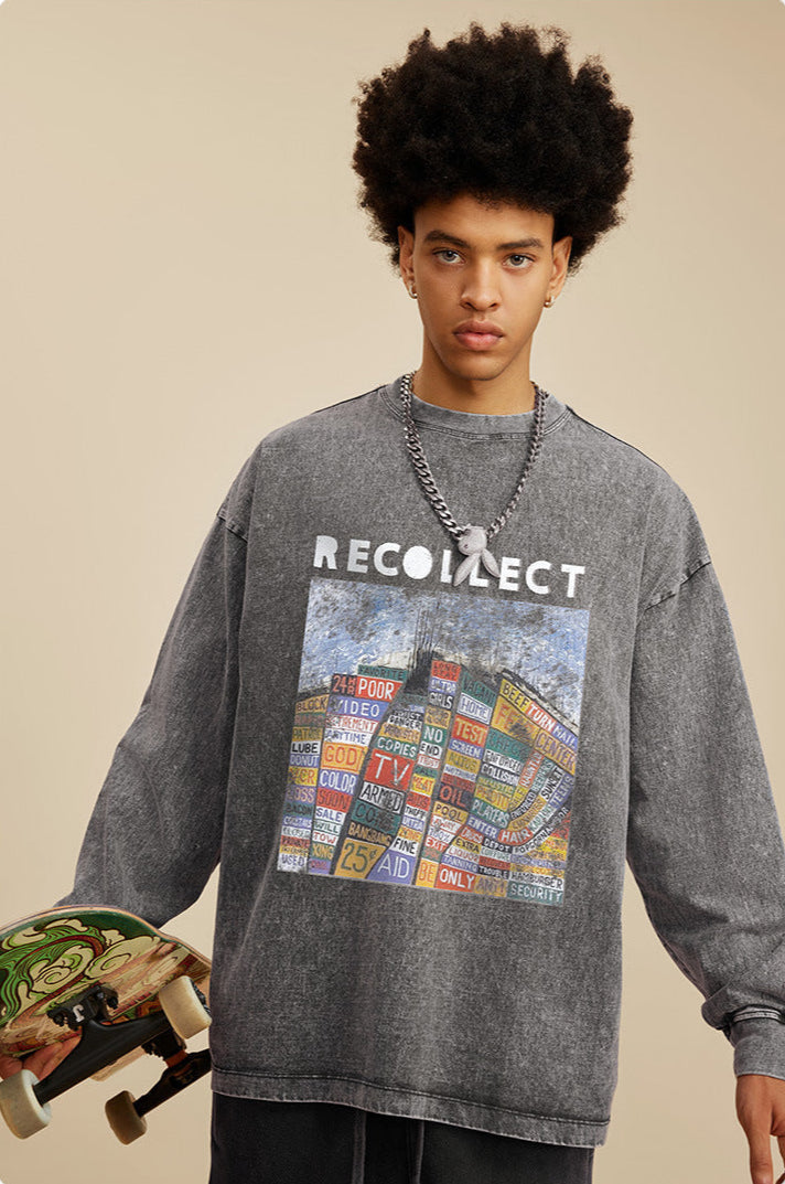A male model wears a gray "RECOLLECT" sweatshirt with a bold graphic, holding a skateboard, posing casually