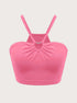 Pink ribbed crop top with adjustable shoulder straps and gathered sweetheart neckline featuring silver V-shaped hardware accent