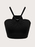 Black ribbed crop top with adjustable shoulder straps and gathered sweetheart neckline featuring silver V-shaped hardware detail