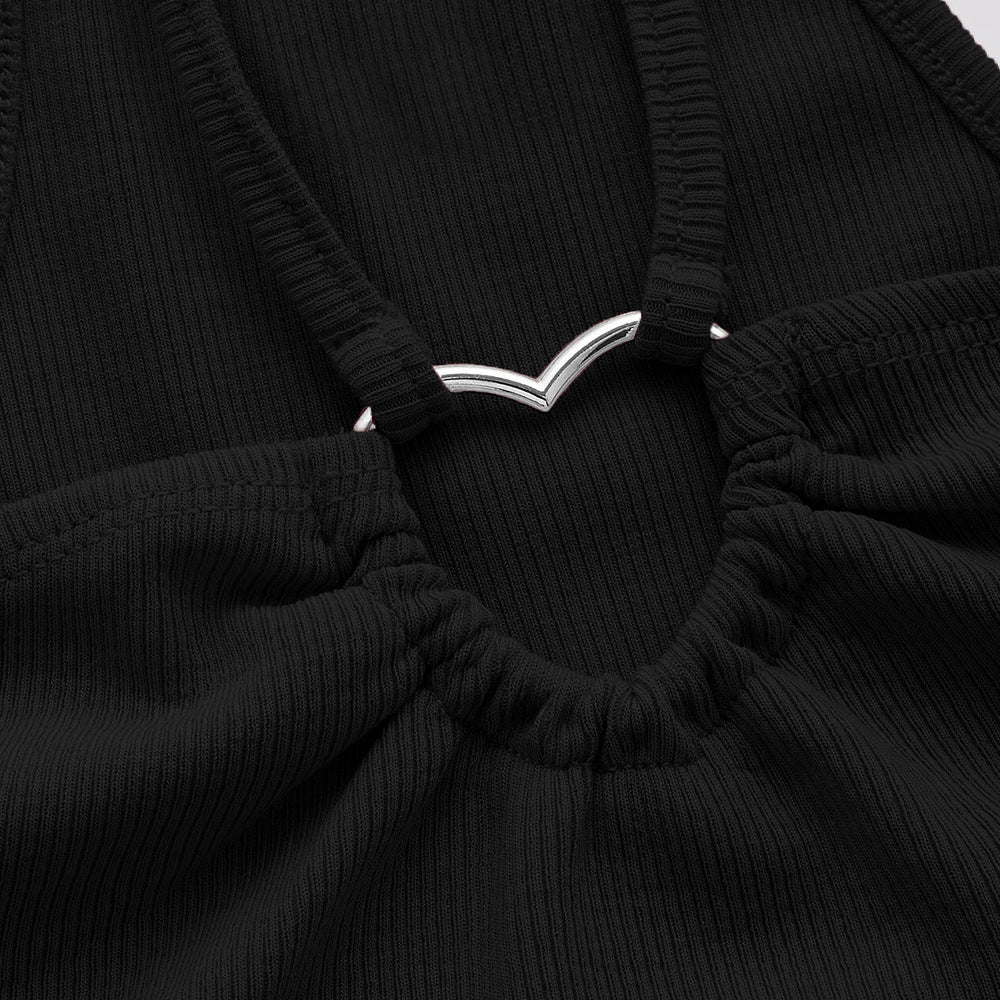Close-up detail of black ribbed crop top showing silver V-shaped metal connector and gathered elastic neckline construction