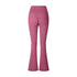 A product photo of dusty rose colored flared yoga pants featuring a high waistband and ruched center detail, shown against a white background