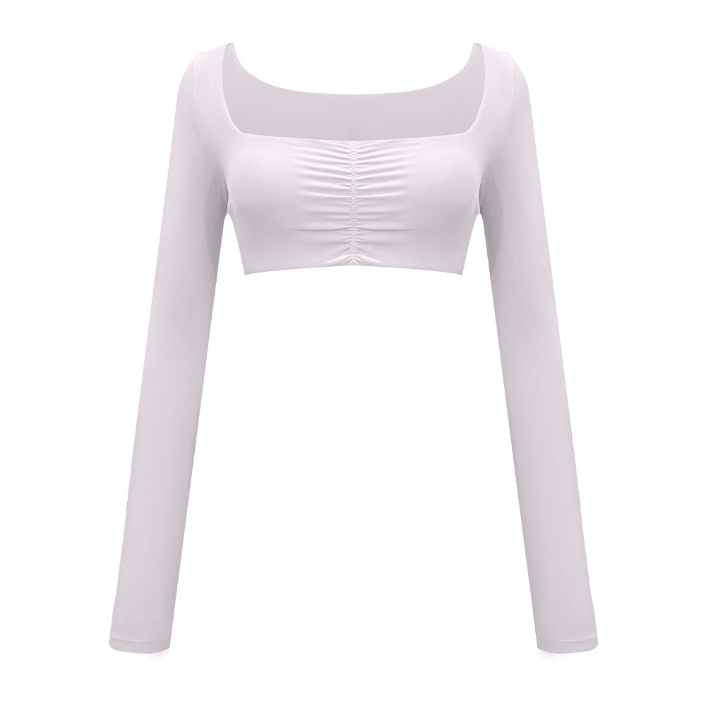 White long-sleeve crop top with ruched center detail and square neckline shown on plain background