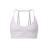 A white strappy sports bra with ruched center detail and thin double-strap design shown against white background