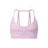 A lavender strappy sports bra with ruched center detail and thin double-strap design displayed on white background