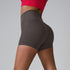 Charcoal gray compression shorts shown from side profile, featuring high waistband and seamless design